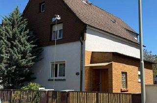 Haus kaufen in 63456 Hanau, Hanau - Freistehendes Zweifamilienhaus in Hanau- Klein Auheim