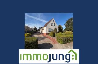 Einfamilienhaus kaufen in 28879 Grasberg, Grasberg - Einfamilienhaus mit zusätzlichem Nebengebäude und großzügigem Garten in zentraler Lage von Grasberg
