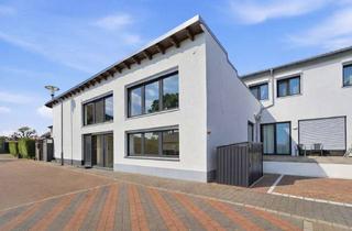 Wohnung kaufen in 64839 Münster, Exclusive 3 Zimmerwohnung mit Hauscharakter Münster-Altheim