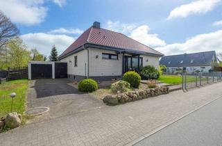 Haus kaufen in 24806 Hohn, Bungalow mit Keller, Garage und Ausbaureserve in ruhiger Lage von Hohn