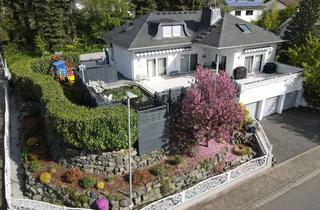 Haus kaufen in 63654 Büdingen, Luxusbungalow in Bestlage: saniert, mit Koiteich, Wellness & unverbaubarem Weitblick