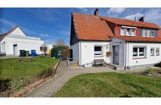 Doppelhaushälfte kaufen in 38364 Schöningen, Mehr als vier Wände: Doppelhaushälfte mit Kamin & Gartenidylle in Schöningen