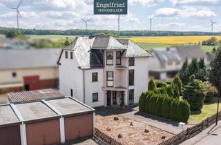 Anlageobjekt in 56291 Kisselbach, Gepflegtes Dreifamilienhaus mit Anbau und Garagenhof auf weitläufigem Baugrundstück