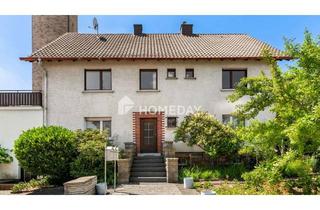 Haus kaufen in 36119 Neuhof, Charmantes MFH mit drei Wohneinheiten, 3 Garagen und Stellplätzen in attraktiver Lage von Neuhof