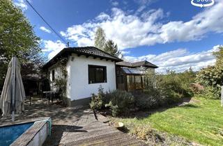 Einfamilienhaus kaufen in 67316 Carlsberg, Charmanter Bungalow mit Gartenparadies und vielseitigem Nutzungspotenzial