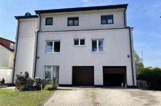 Mehrfamilienhaus kaufen in 63150 Heusenstamm, Modernes Mehrfamilienhaus in Heusenstamm - stilvoll wohnen, nachhaltig investieren