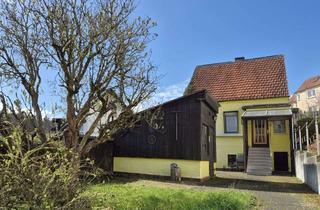 Einfamilienhaus kaufen in 65207 Rambach, Freistehendes Einfamilienhaus mit sonnigem Traumgrundstück und Weitblick in Wiesbaden-Rambach