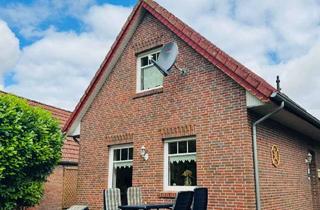 Einfamilienhaus kaufen in 26736 Krummhörn, Schmuckes Einfamilienhaus mit Gartenidyll in ruhiger Lage