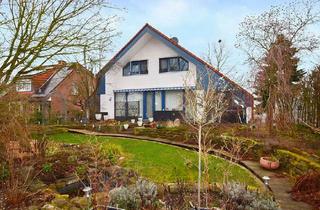 Einfamilienhaus kaufen in 31275 Lehrte, Lichtdurchflutetes Einfamilienhaus mit Kamin und Wintergarten in bester Lage von Lehrte-Sievershause