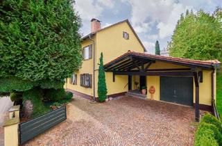 Haus kaufen in 86916 Kaufering, Rückzugsort mit Niveau – Gartenidylle und großzügiges Wohnen vereint