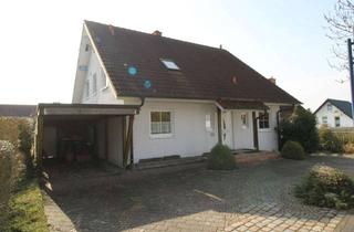 Einfamilienhaus kaufen in 34308 Bad Emstal, Charmantes Einfamilienhaus mit 6 Zimmern, großem Garten und Carport in gehobener Nachbarschaft