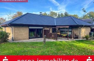 Haus kaufen in 25853 Drelsdorf, Reserviert: Gepflegter Winkelbungalow mit Südwest-Terrasse und massiver Garage in Drelsdorf