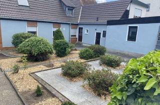 Anlageobjekt in 90513 Zirndorf, Außergewöhnliche 3-Zimmer-Wohnung auf 2 Etagen mit Steingarten