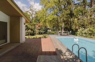 Haus kaufen in 67454 Haßloch, Mid-Century Wohnhaus mit Pool & Privatspähre - Wohnen & Arbeiten auf 1.900 qm Areal!