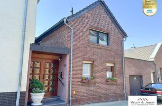 Einfamilienhaus kaufen in 41569 Rommerskirchen, Charmantes und großzügiges Einfamilienhaus in Rommerskirchen zu verkaufen