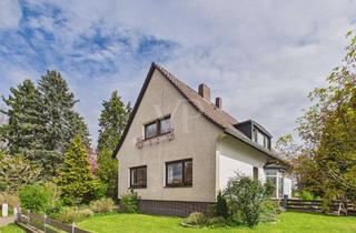 Einfamilienhaus kaufen in 31303 Burgdorf, Blick ins Grüne! Einfamilienhaus mit Einliegerwohnung und Keller