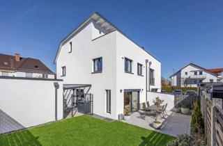 Doppelhaushälfte kaufen in 82110 Germering, Familiengerechte Doppelhaushälfte in moderner Ästhetik mit Südterrasse und Garten