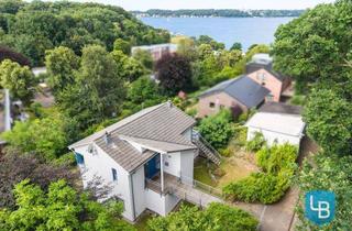 Einfamilienhaus kaufen in 24248 Mönkeberg, Wo Architektur auf Fördenähe trifft – außergewöhnliches Einfamilienhaus in Heikendorf