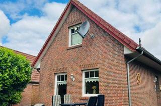 Einfamilienhaus kaufen in 26736 Krummhörn, Schmuckes Einfamilienhaus mit Gartenidyll in ruhiger Lage