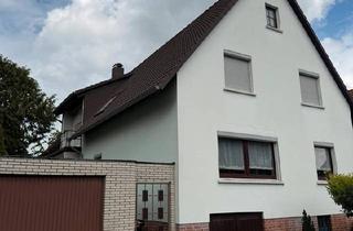Einfamilienhaus kaufen in 30823 Garbsen, Garbsen - Einfamilienhaus mit 3- Wohneinheiten in top Lage
