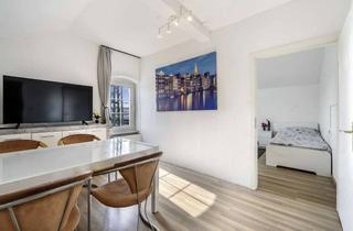 Wohnung kaufen in 35457 Lollar, TOP Rendite - vermietete DG-Wohnung für Monteure im Herzen von Lollar