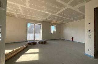 Wohnung kaufen in 48465 Schüttorf, exklusive Neubau-Eigentumswohnung mit Balkon
