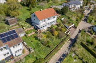Einfamilienhaus kaufen in 75181 Eutingen, Stilvolles Einfamilienhaus mit großem Entwicklungspotenzial und Doppelgarage in sonniger Hanglage
