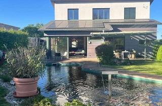 Haus kaufen in Am Asperstück, 35091 Cölbe, Bezugsfertiges Luxus Ökohaus A+ mit Schwimmteich und Traumgarten