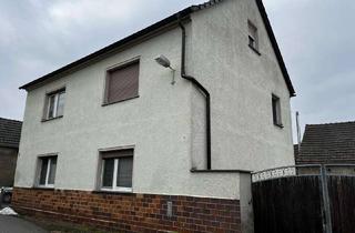 Haus kaufen in 01945 Ruhland, Zweifamilienwohnhaus mit Nebengebäuden in Ruhland