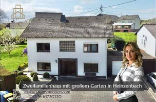 Haus kaufen in 55483 Heinzenbach, Ruhe, Raum und Perspektive in Heinzenbach: Großzügiges Zweifamilienhaus in idyllischer Hunsrücklage