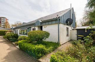 Doppelhaushälfte kaufen in 25813 Husum, Außergewöhnliches Design, Top-Lage in Husum: Modernisierte Doppelhaushälfte mit besonderem Flair.