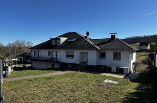Mehrfamilienhaus kaufen in 56653 Wehr, Attraktives Mehrfamilienhaus mit stabilem Mietertrag und Entwicklungspotenzial