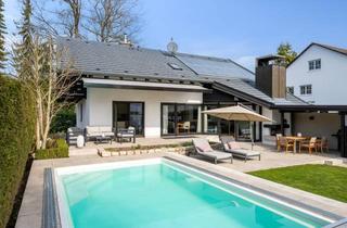 Einfamilienhaus kaufen in 82194 Gröbenzell, AIGNER - Exklusives Einfamilienhaus mit traumhaftem Südgarten und Pool
