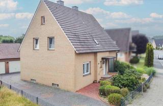 Einfamilienhaus kaufen in 33775 Versmold, Sofort bezugsfrei: Tolles Zweifamilienhaus mit Garten und 2 Garagen in Versmold-Bockhorst