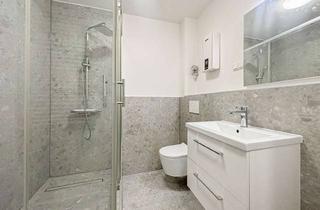 Wohnung kaufen in 42653 Gräfrath, Zwei schick modernisierte Appartements