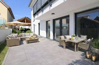 Wohnung kaufen in 63773 Goldbach, Barrierefreier Wohntraum: Erstbezug mit Garten, Terrasse & Carports in Goldbach.