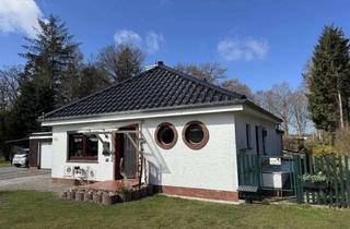 Haus kaufen in 27639 Nordholz, Walmdachbungalow auf parkähnlichem Grundstück