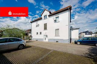 Mehrfamilienhaus kaufen in 61203 Reichelsheim, Reichelsheim-Beienheim: Mehrfamilienhaus mit Anbau und Gewerbeflächen auf großem Grundstück