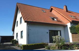Doppelhaushälfte kaufen in 32130 Enger, Attraktive Doppelhaushälfte mit großzügigem Carport in zentraler Wohnlage von Enger