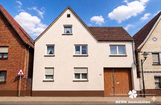 Haus kaufen in 63853 Mömlingen, BERK Immobilien - Vielseitiges Zweifamilienhaus mit viel Platz in Mömlingen