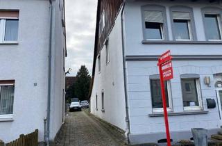 Doppelhaushälfte kaufen in Hospitalstr. 8 A, 32839 Steinheim, Doppelhaushälfte mit Doppelgarage und 2 Carports in zentraler Lage von Steinheim