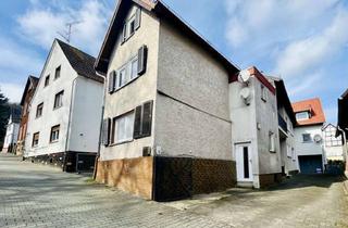 Wohnung kaufen in 35510 Butzbach, Vermietete Vorderhaus-Einheit mit Garage, Dachboden und historischem Charme