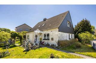 Haus kaufen in 27612 Loxstedt, Charmantes Familienhaus mit Gartenidylle, PV-Anlage und viel Platz zur Entfaltung | Loxstedt
