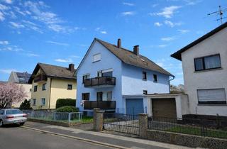 Haus kaufen in 63165 Mühlheim, 7-Familienhaus in ruhiger Lage der Markwaldsiedlung mit 5 Garagen und zusätzlichem Stellplatz!