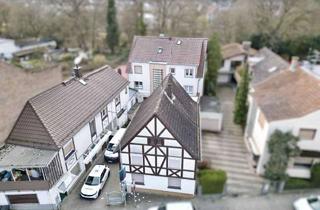 Haus kaufen in 63165 Mühlheim, 3 Häuser in einem: Renditestarke Wohn- und Geschäftsimmobilie mit großem Potenzial