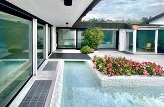 Haus kaufen in 82024 Taufkirchen, Seltene Gelegenheit: Luxus-Bungalow mit Gewerbeeinheit im Münchner Süden