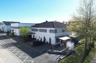 Haus kaufen in 34281 Gudensberg, Gudensberg - Grenzenlose Möglichkeiten: Ihr modernes Wohn- und Geschäftshaus mit Halle und Top-Effizienz in Gudensberg!
