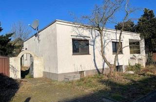 Doppelhaushälfte kaufen in 47259 Duisburg, Duisburg - Bungalow auf schönem Eckgrundstück nähe Rhein
