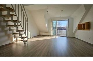 Wohnung kaufen in 85399 Hallbergmoos, Helle 2-Zimmer-Dachgeschosswohnung mit Galerie und Balkon in ruhiger Lage in Hallbergmoos