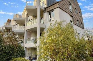 Wohnung kaufen in Herblayer Straße, 65232 Taunusstein, Moderne 2-Zimmer-Gartenwohnung mit Kamin & eigener Garage